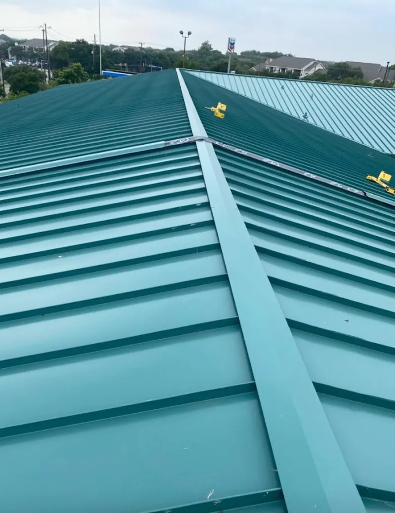Green commercial metal roof ridge and valley for Metal Roof Repair in Luzerne